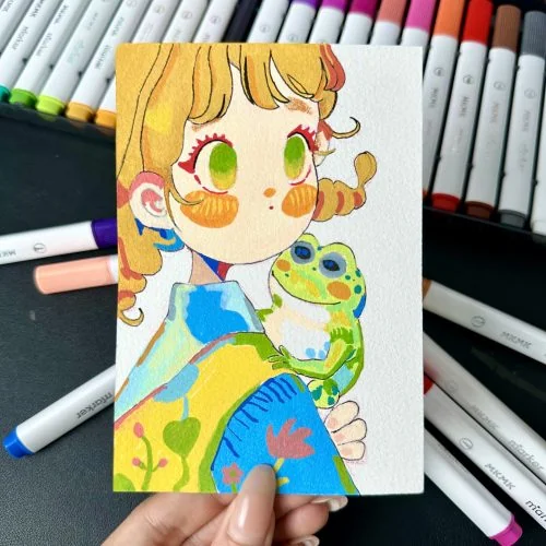 Colorful character drawing beside markers